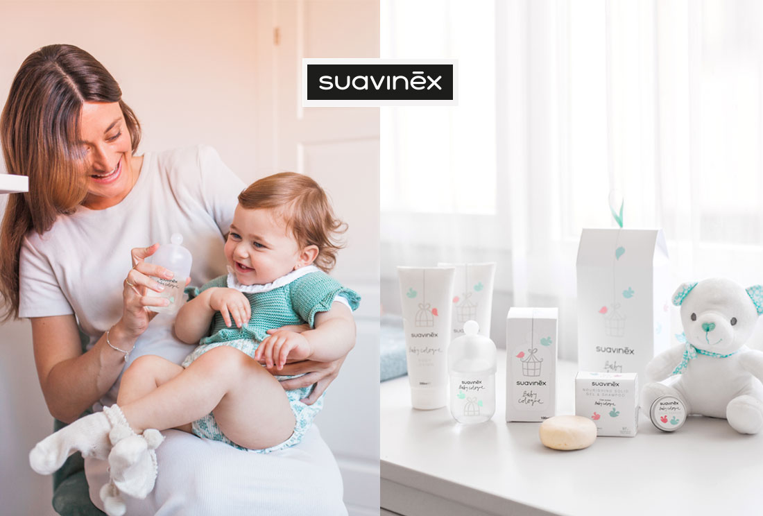 Mujer con un bebe y al lado productos de Suavinex